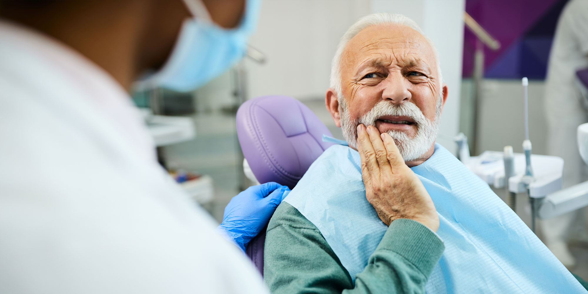 patient with peri implantits in pain from implant failure2